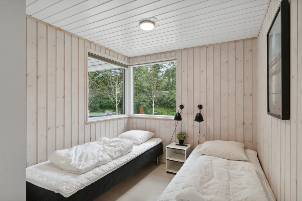 Ett av de 5 utmärkta sovrummen i lyxstuga nr 339 i Nordsjälland.