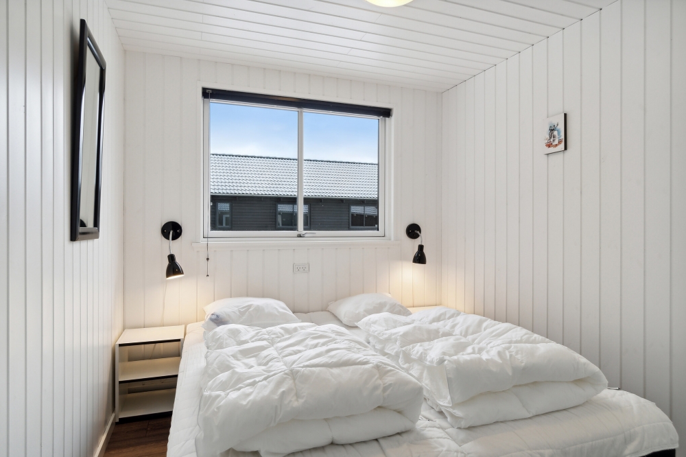 Ett av de 8 utmärkta sovrummen i lyxstuga nr 351 i Nordsjälland.