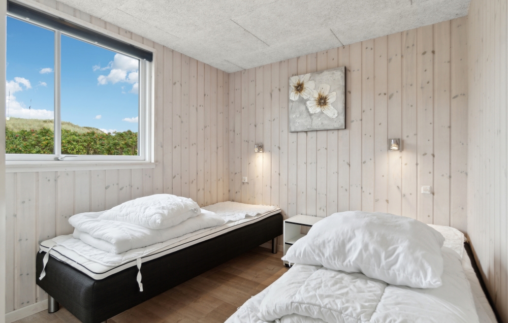 Ett av de 7 utmärkta sovrummen i lyxstuga nr 363 i Vestjylland.