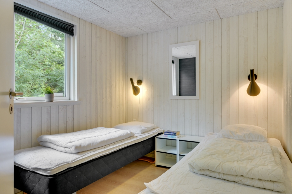 Ett av de 8 utmärkta sovrummen i lyxstuga nr 365 i Nordsjälland.