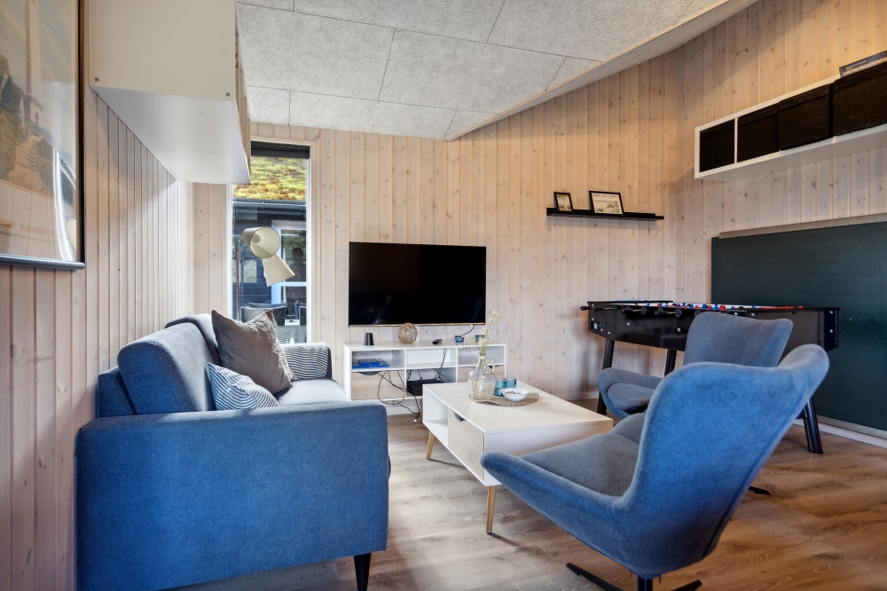 Tävla i sommarhusets aktivitetsrum när ni besöker lyxhus nr 371 i Vestjylland.