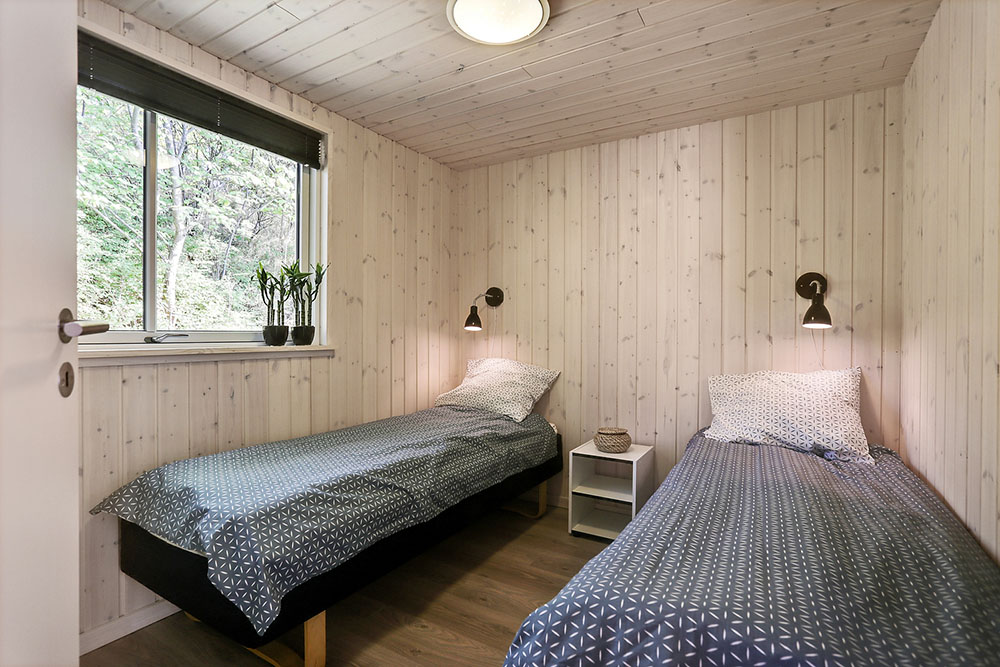 Ett av de 7 utmärkta sovrummen i lyxstuga nr 378 i Nordsjälland.