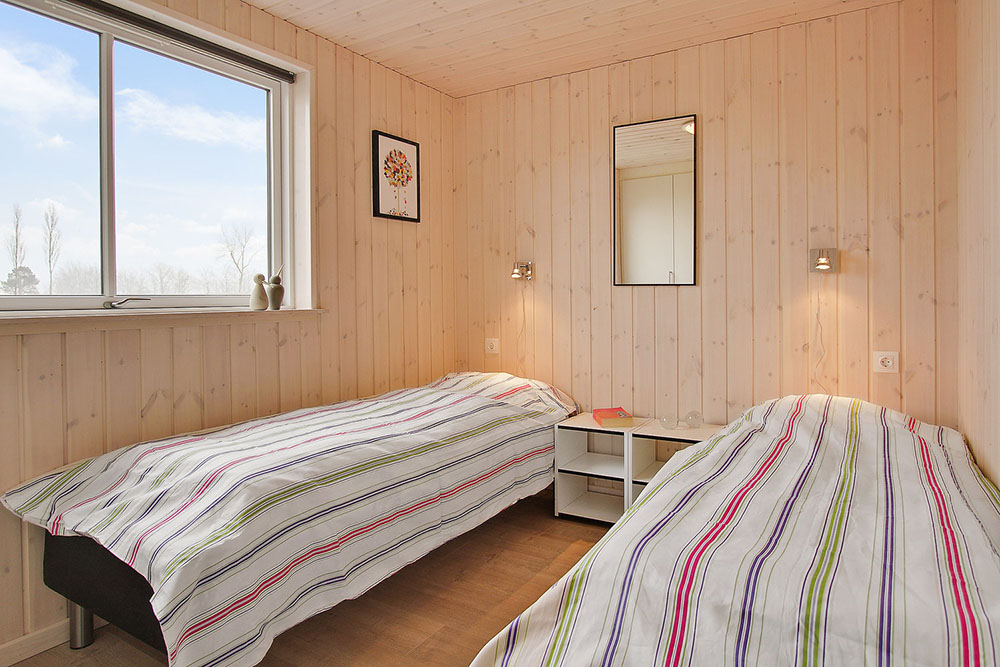 Ett av de 8 utmärkta sovrummen i lyxstuga nr 703 i Tyskland.