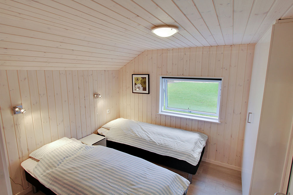 Ett av de 5 utmärkta sovrummen i lyxstuga nr 708 i Tyskland.