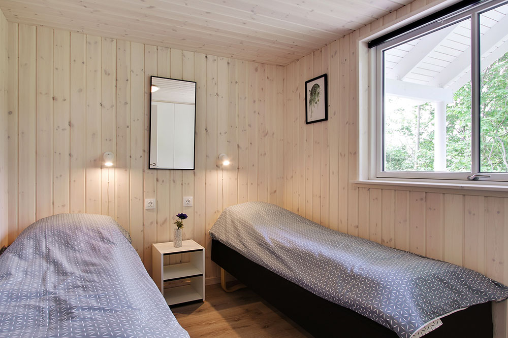 Ett av de 9 utmärkta sovrummen i lyxstuga nr 714 i Tyskland.