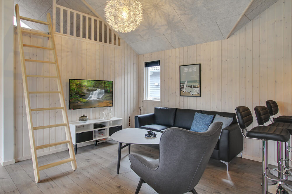 Tävla i sommarhusets aktivitetsrum när ni besöker lyxhus nr 409 i Vestjylland.