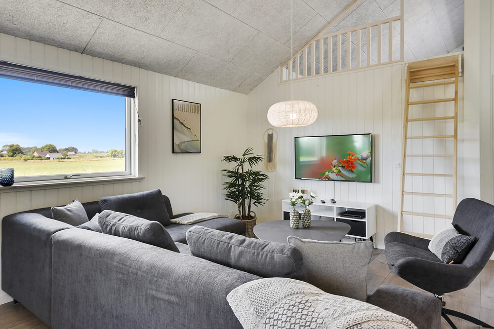Tävla i sommarhusets aktivitetsrum när ni besöker lyxhus nr 403 i Lolland/Falster/Møn.