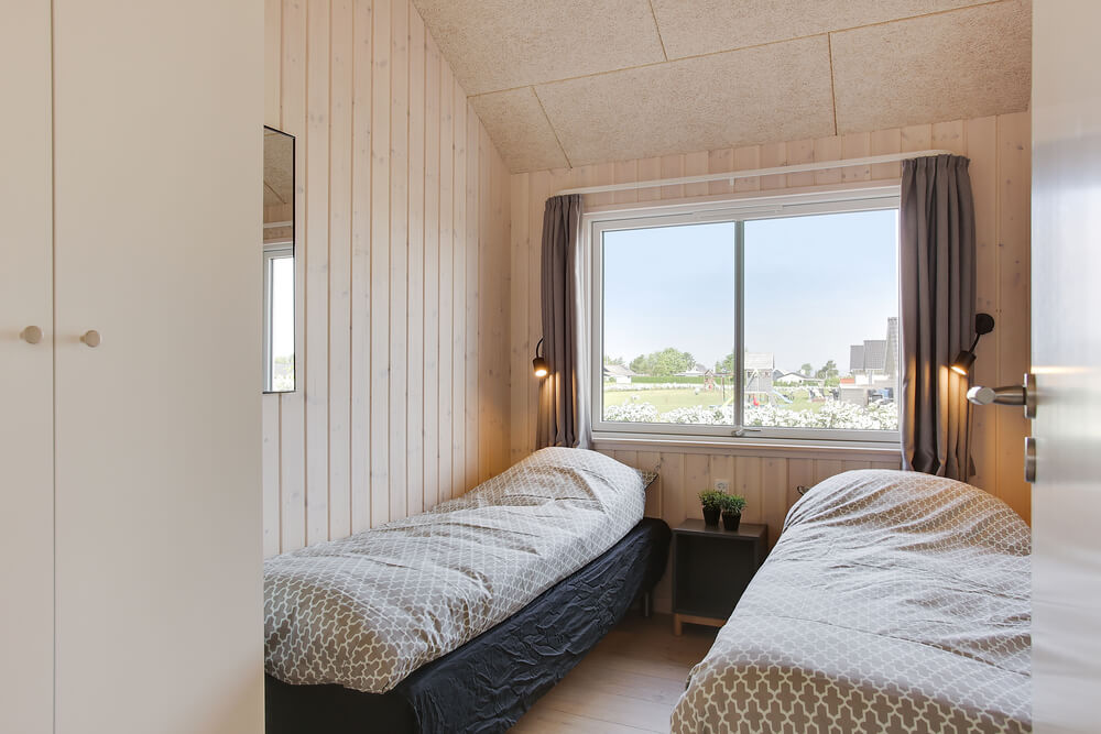 Ett av de 5 utmärkta sovrummen i lyxstuga nr 418 i Fyn och öar.