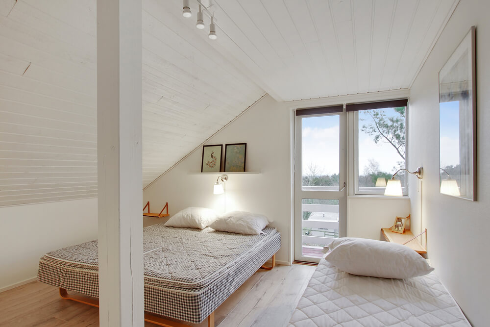 Ett av de 8 utmärkta sovrummen i lyxstuga nr 423 i Østjylland.