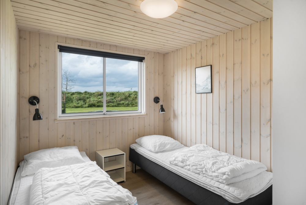 Ett av de 9 utmärkta sovrummen i lyxstuga nr 440 i Nordjylland.