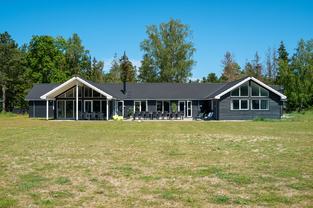 Den praktfulla poolstugan nr 436 med plats för 30 personer ligger i Nordsjälland