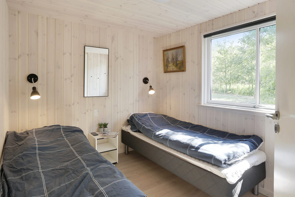 Ett av de 6 utmärkta sovrummen i lyxstuga nr 433 i Lolland/Falster/Møn.