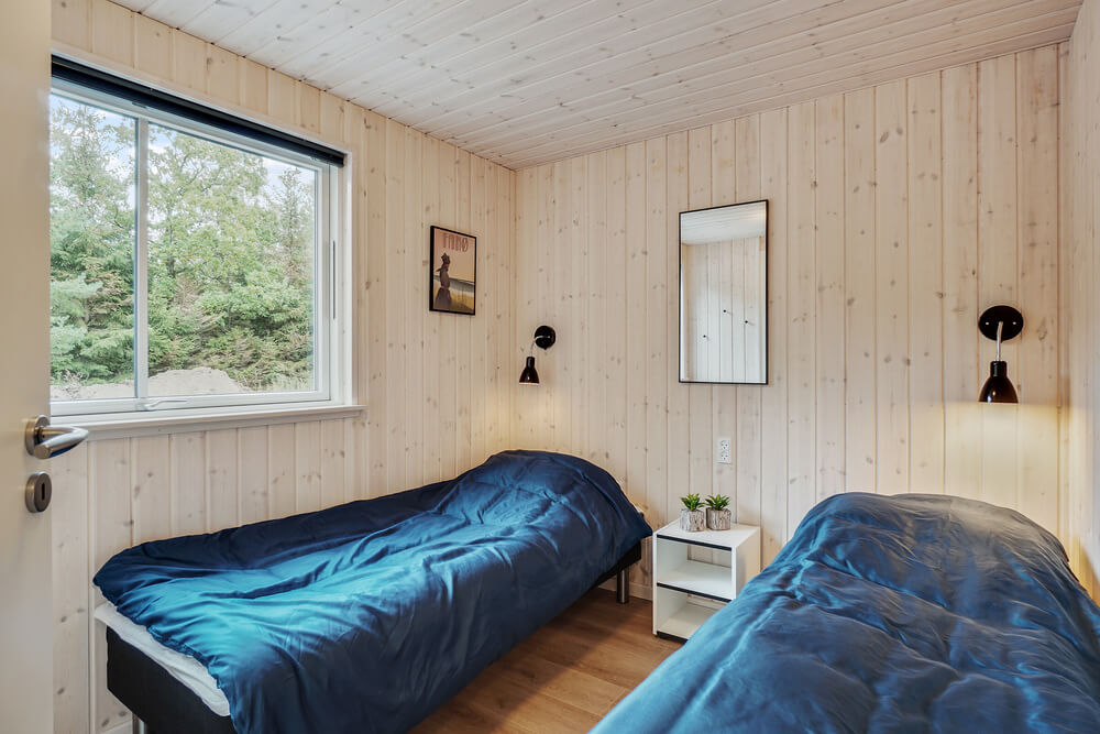 Ett av de 8 utmärkta sovrummen i lyxstuga nr 434 i Nordsjälland.