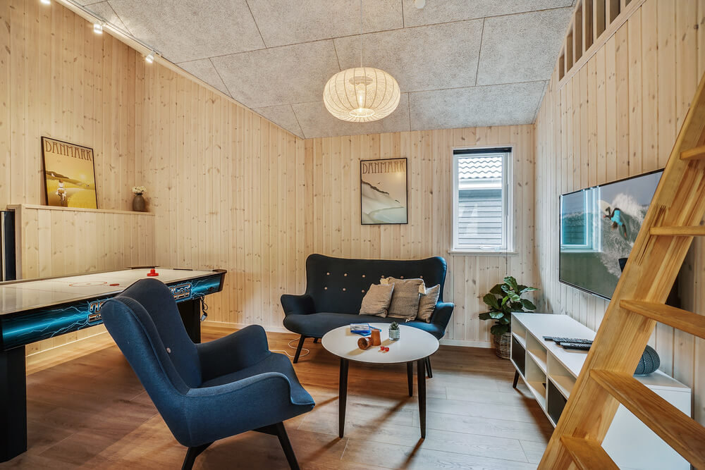 Tävla i sommarhusets aktivitetsrum när ni besöker lyxhus nr 434 i Nordsjälland.