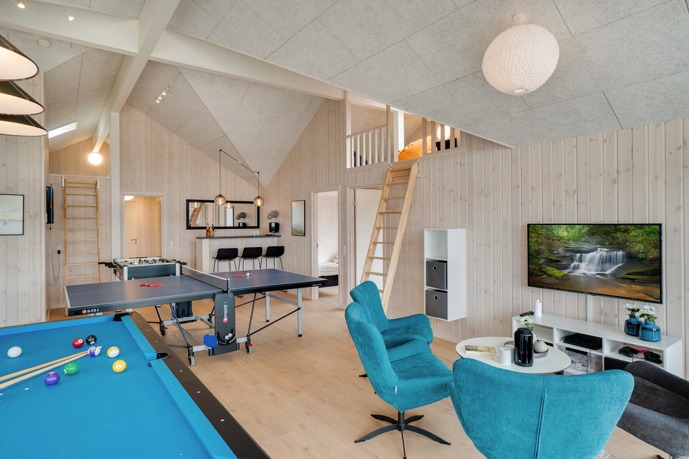 Tävla i sommarhusets aktivitetsrum när ni besöker lyxhus nr 465 i Vestjylland.
