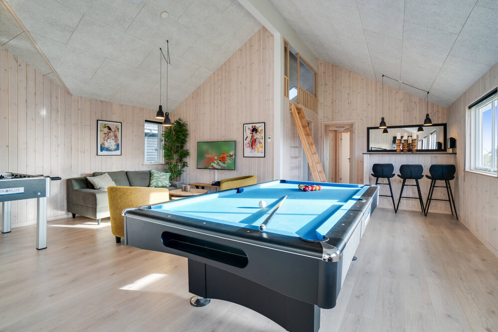 Tävla i sommarhusets aktivitetsrum när ni besöker lyxhus nr 478 i Vestjylland.
