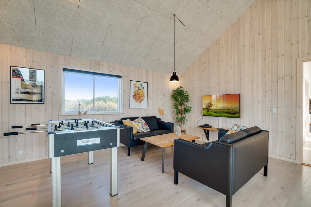 Tävla i sommarhusets aktivitetsrum när ni besöker lyxhus nr 477 i Vestjylland.