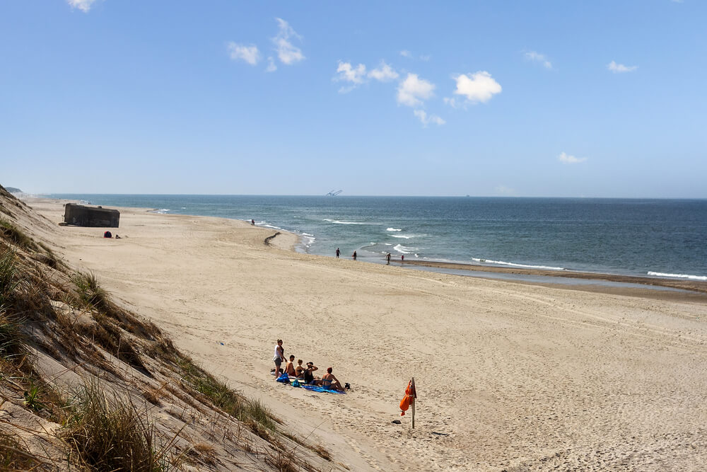 Stranden i närheten av lyxhus 486.