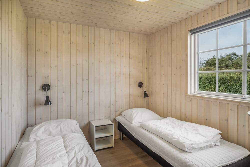 Ett av de 10 utmärkta sovrummen i lyxstuga nr 500 i Nordjylland.