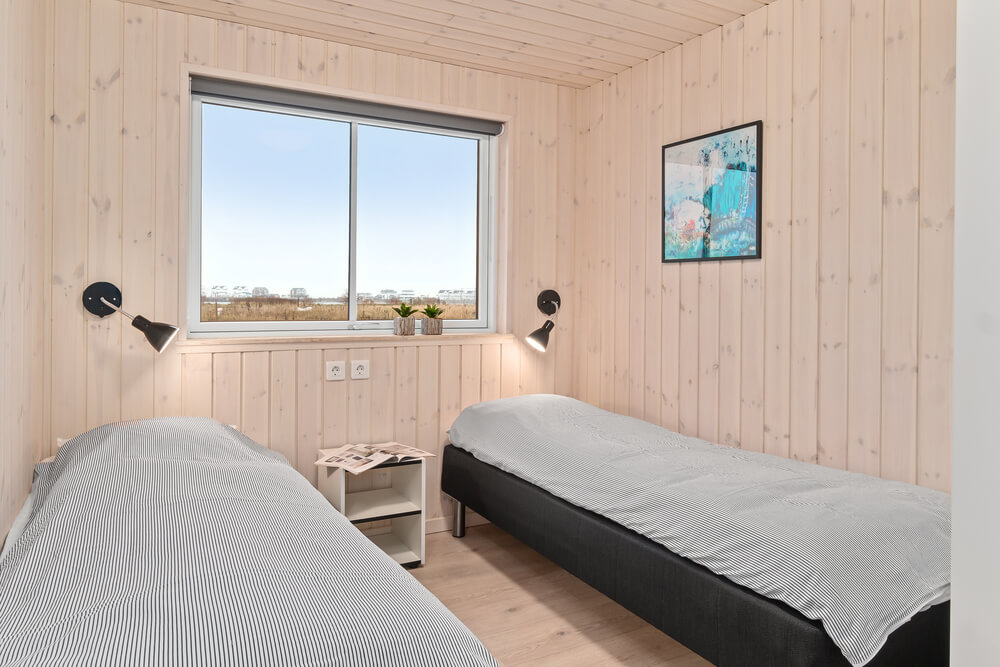 Ett av de 7 utmärkta sovrummen i lyxstuga nr 733 i Tyskland.