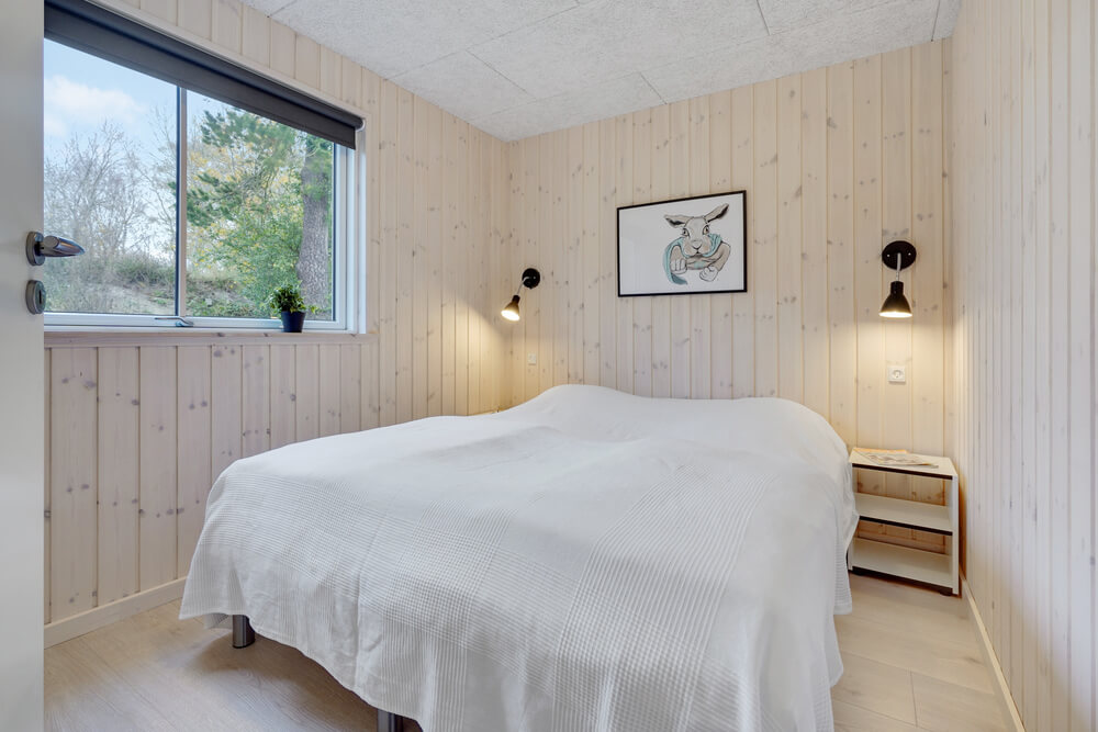 Ett av de 6 utmärkta sovrummen i lyxstuga nr 509 i Lolland/Falster/Møn.