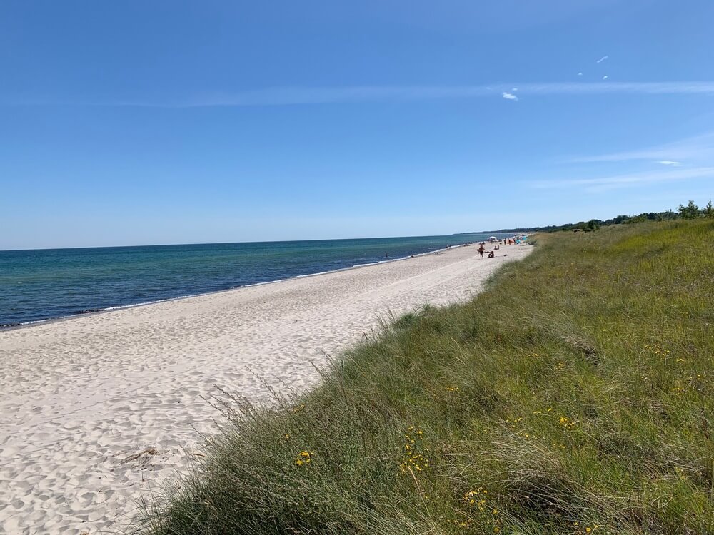 Stranden i närheten av lyxhus 517.