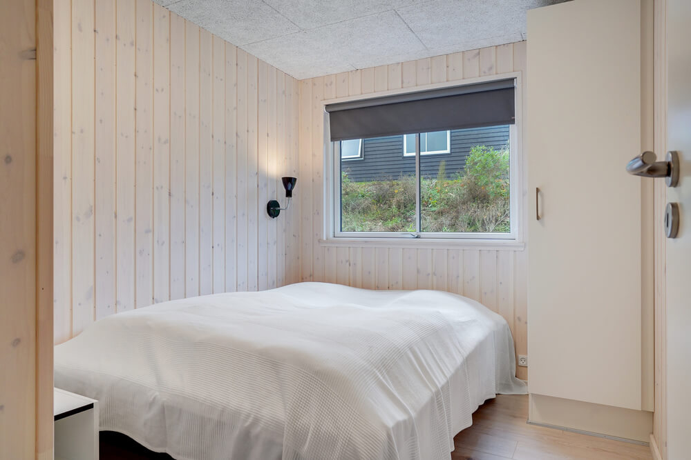 Ett av de 10 utmärkta sovrummen i lyxstuga nr 530 i Sydjylland.