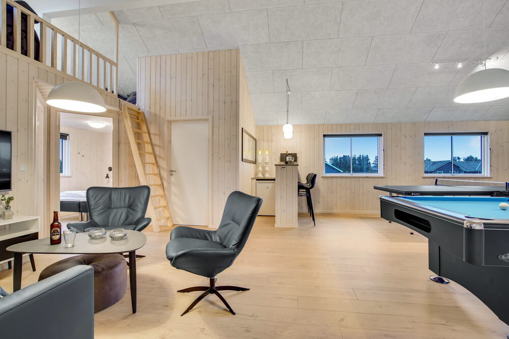 Tävla i sommarhusets aktivitetsrum när ni besöker lyxhus nr 529 i Nordjylland.