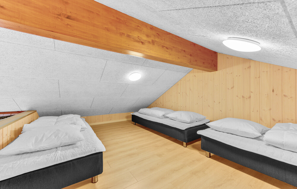 Det finns loft och 4 sovrum i lyxstuga nr 539.