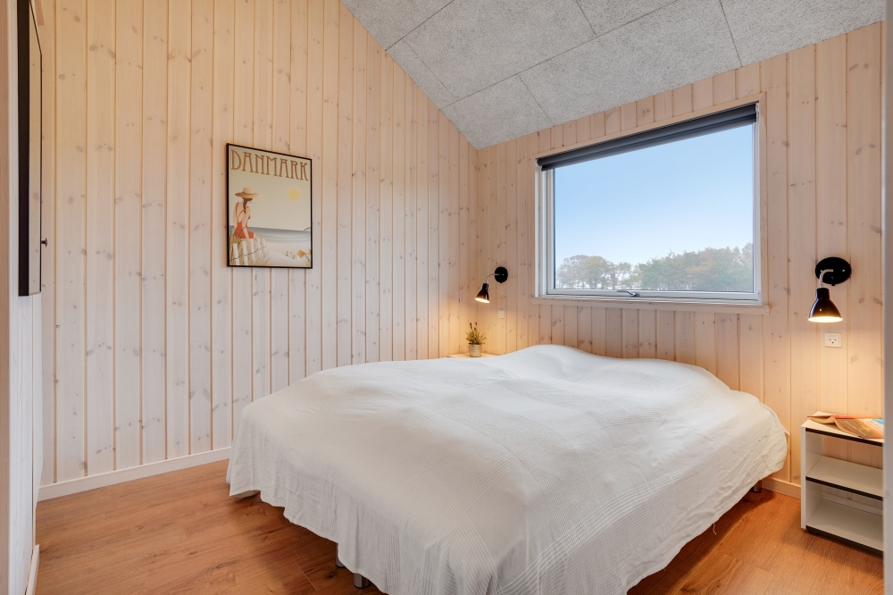 Ett av de 5 utmärkta sovrummen i lyxstuga nr 544 i Østjylland.