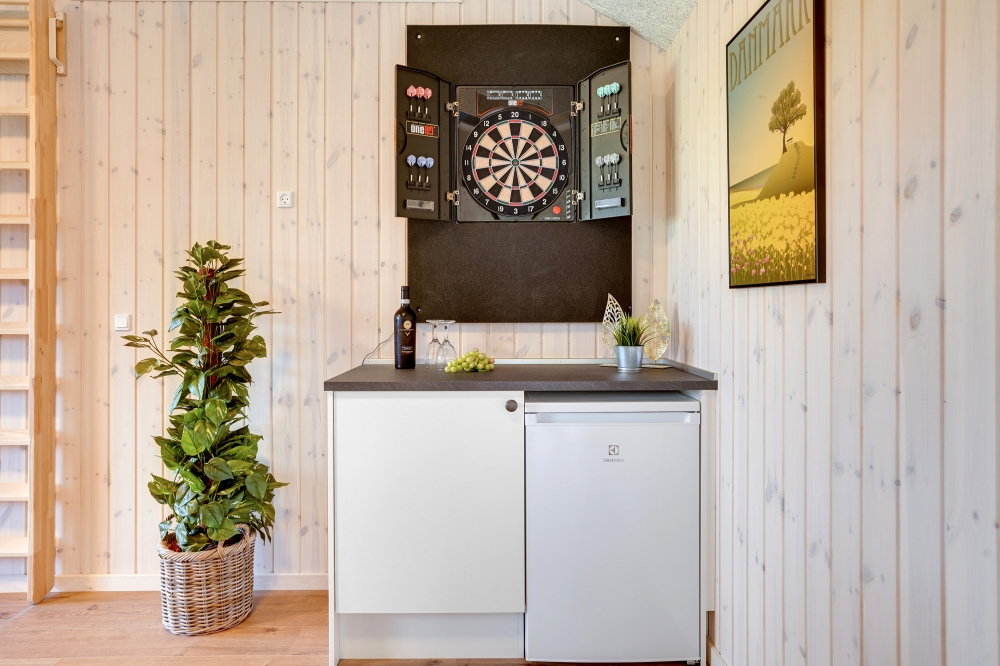 Tävla i sommarhusets aktivitetsrum när ni besöker lyxhus nr 544 i Østjylland.