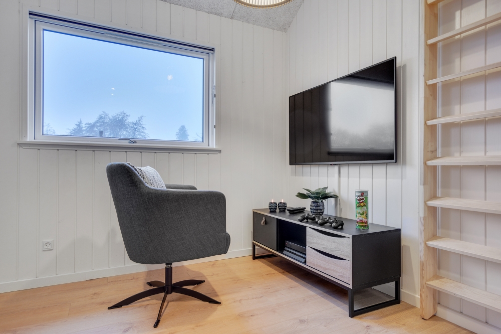 Aktivitetsrum i lyxstuga nr 549 med 5 sovrum och plats för 14 personer.
