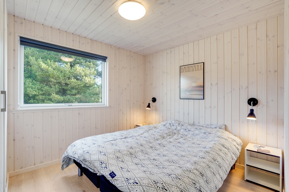 Ett av de 5 utmärkta sovrummen i lyxstuga nr 540 i Vestjylland.