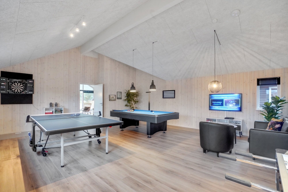 Tävla i sommarhusets aktivitetsrum när ni besöker lyxhus nr 545 i Limfjorden.