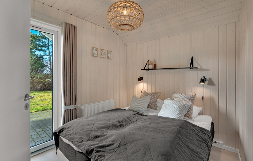 Ett av de 8 utmärkta sovrummen i lyxstuga nr 571 i Sydjylland.