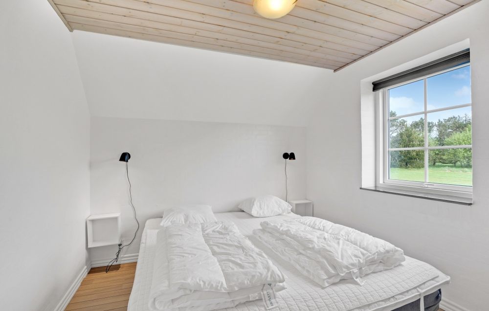 Ett av de 7 utmärkta sovrummen i lyxstuga nr 573 i Vestjylland.
