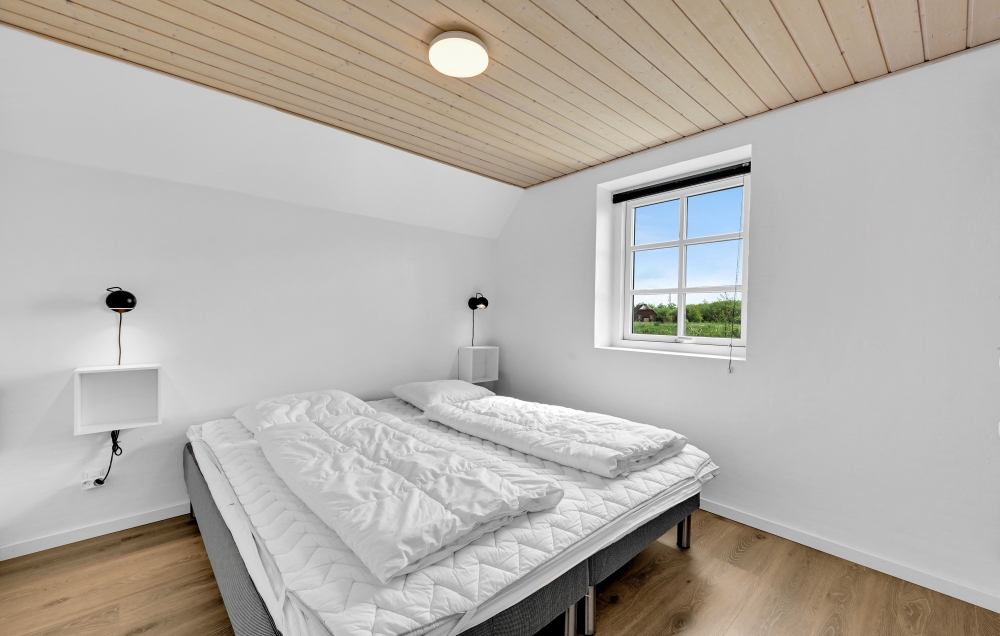 Ett av de 7 utmärkta sovrummen i lyxstuga nr 575 i Vestjylland.