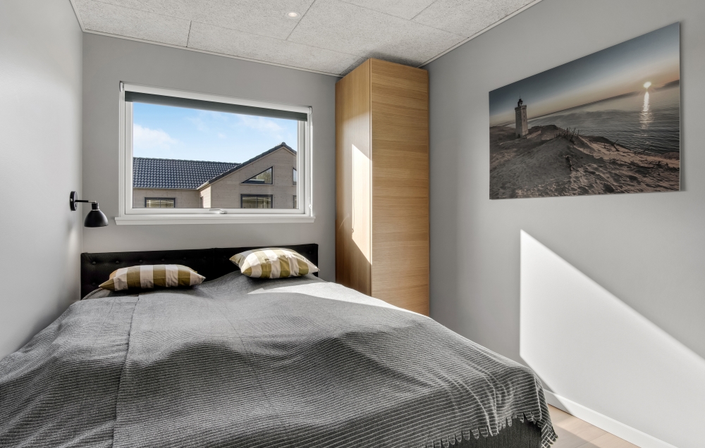 Ett av de 10 utmärkta sovrummen i lyxstuga nr 554 i Vestjylland.