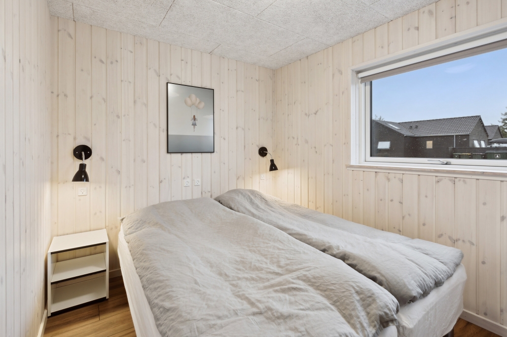 Ett av de 6 utmärkta sovrummen i lyxstuga nr 599 i Sydjylland.