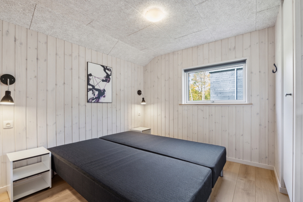 Ett av de 5 utmärkta sovrummen i lyxstuga nr 754 i Tyskland.