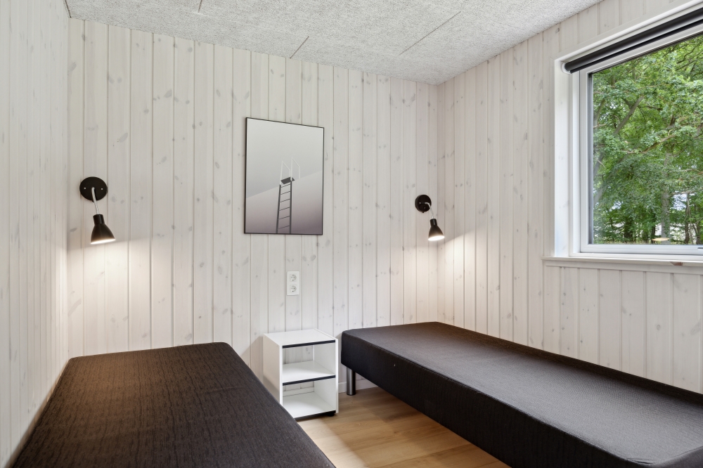Ett av de 6 utmärkta sovrummen i lyxstuga nr 757 i Tyskland.