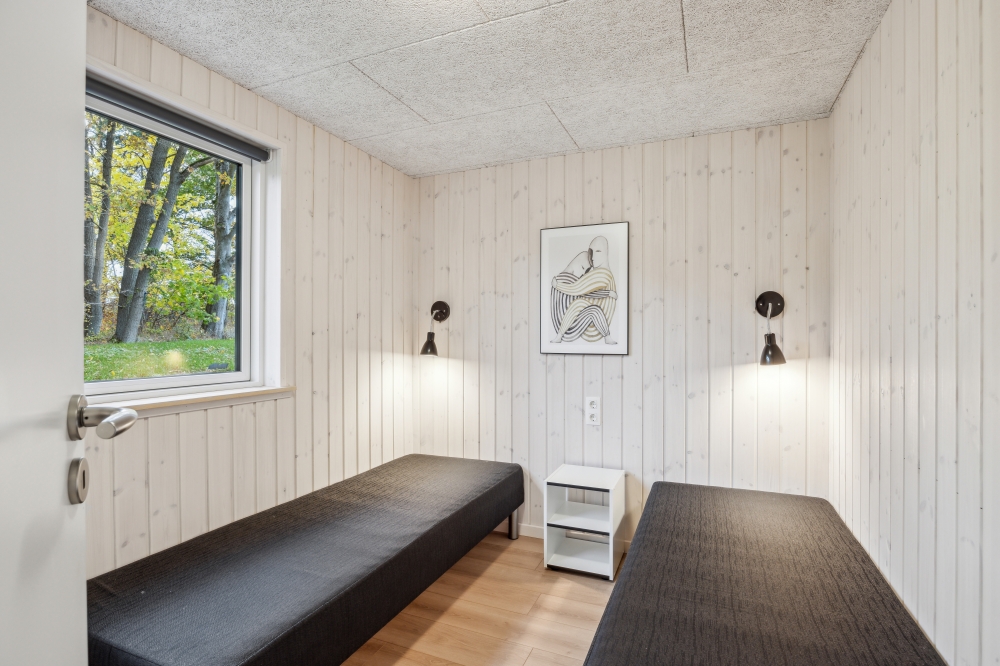 Ett av de 9 utmärkta sovrummen i lyxstuga nr 758 i Tyskland.