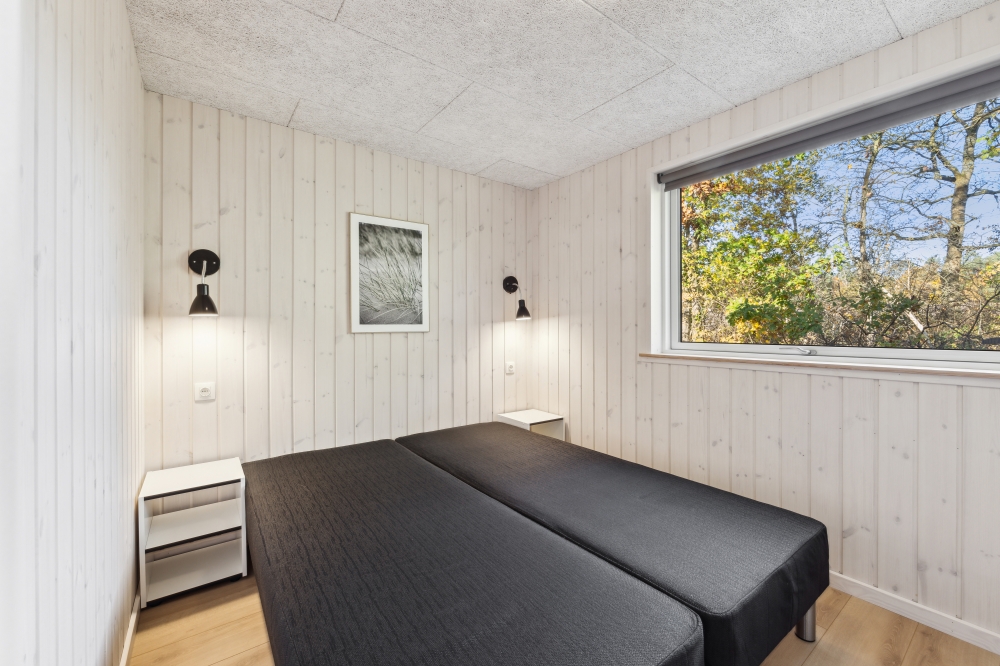 Ett av de 7 utmärkta sovrummen i lyxstuga nr 759 i Tyskland.