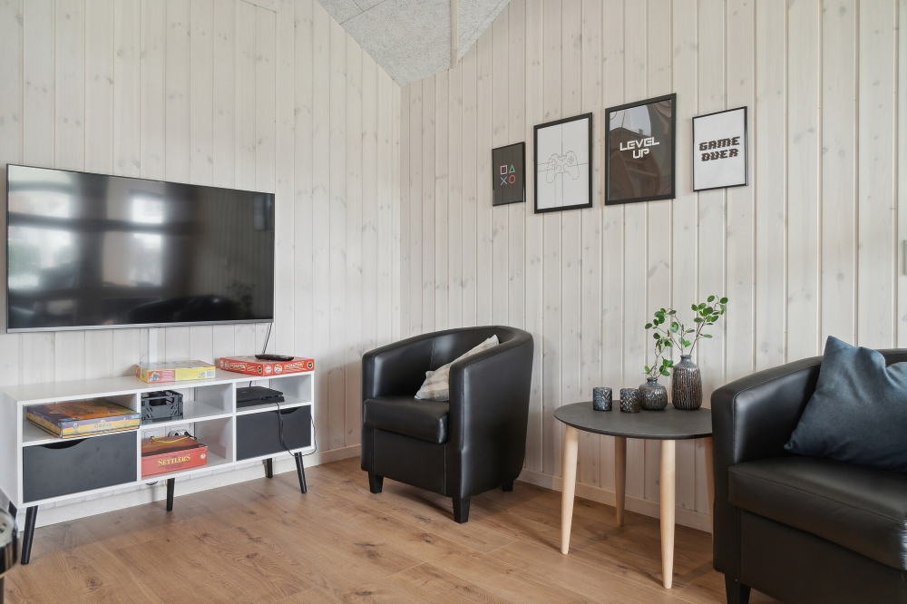 Tävla i sommarhusets aktivitetsrum när ni besöker lyxhus nr 588 i Lolland/Falster/Møn.