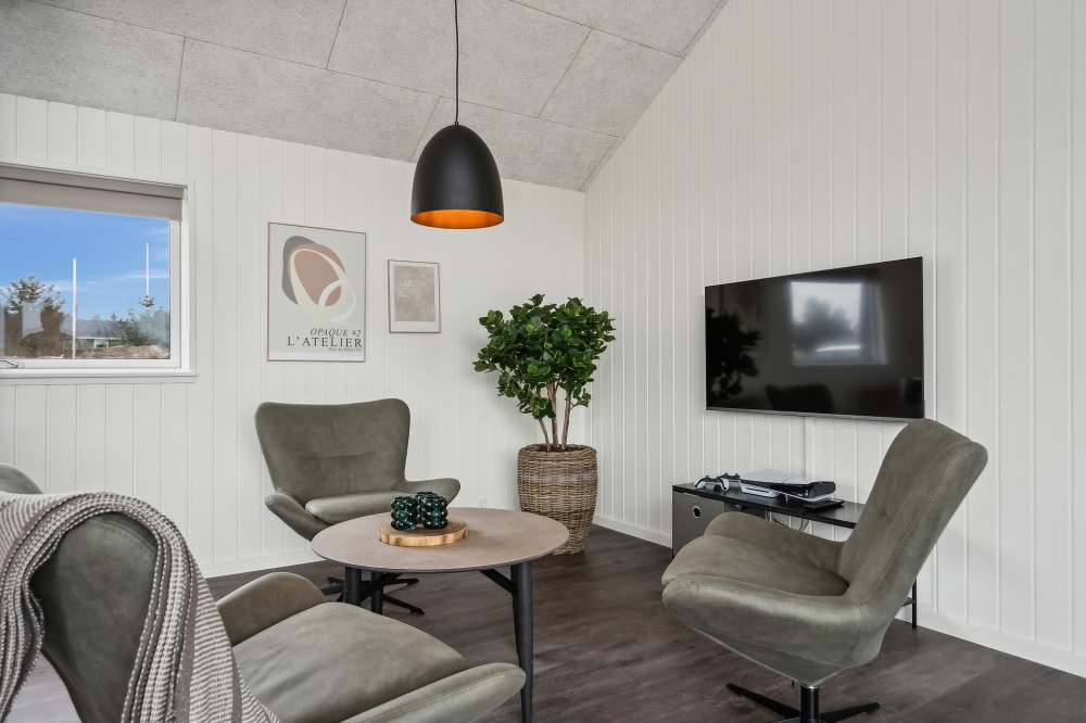 Tävla i sommarhusets aktivitetsrum när ni besöker lyxhus nr 610 i Vestjylland.