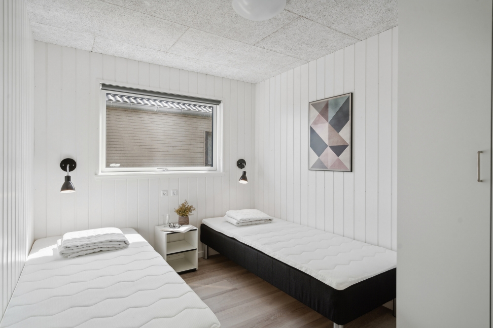 Ett av de 6 utmärkta sovrummen i lyxstuga nr 614 i Fyn och öar.