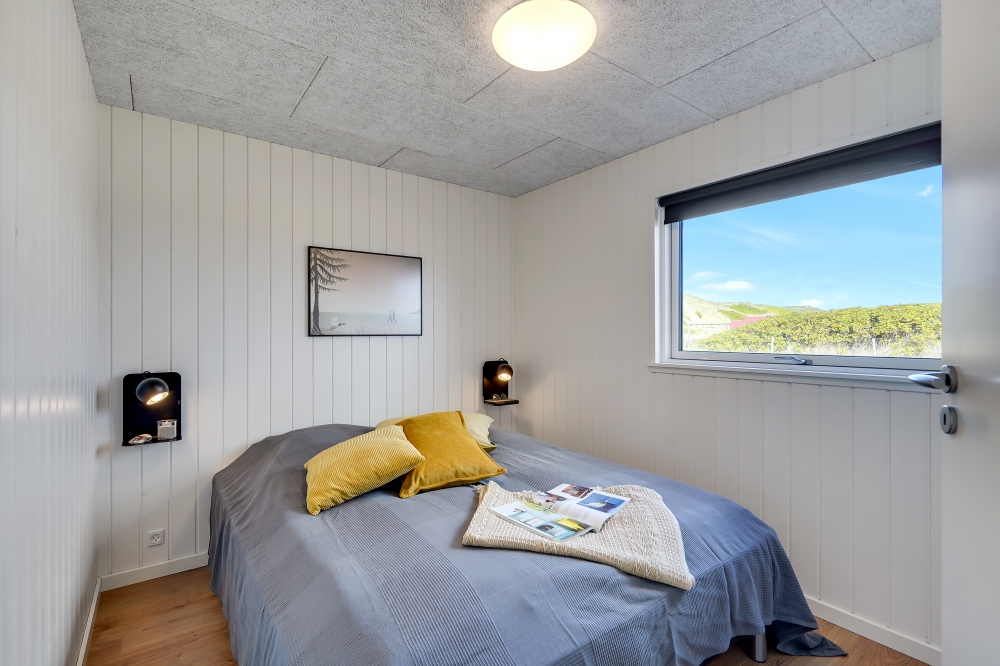 Ett av de 7 utmärkta sovrummen i lyxstuga nr 622 i Bornholm.