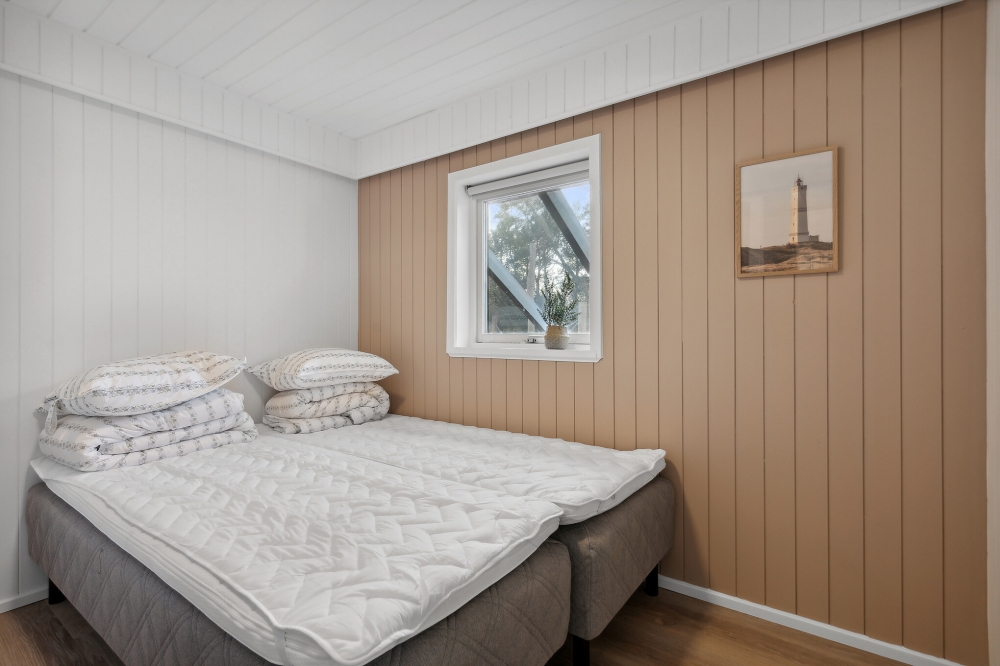 Ett av de 5 utmärkta sovrummen i lyxstuga nr 623 i Vestjylland.