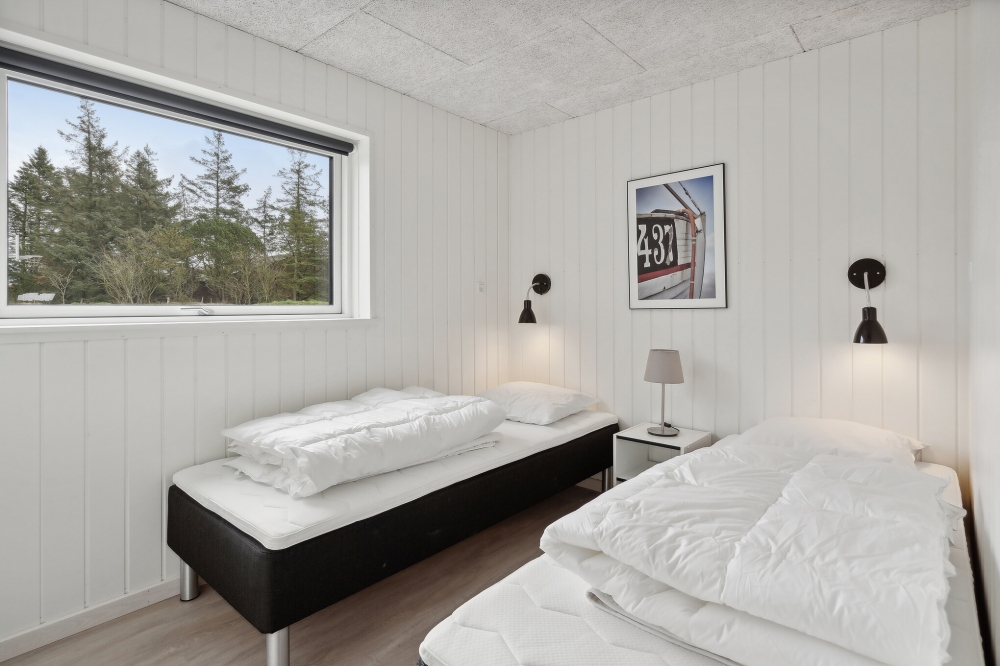 Ett av de 5 utmärkta sovrummen i lyxstuga nr 624 i Sydjylland.