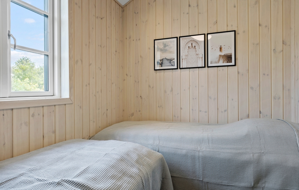 Ett av de 8 utmärkta sovrummen i lyxstuga nr 629 i Sydjylland.